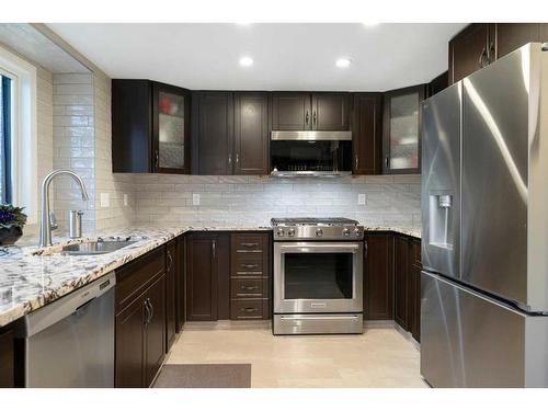 77 Shannon Circle Sw, Calgary, AB - Indoor Photo Showing Kitchen With Stainless Steel Kitchen With Upgraded Kitchen