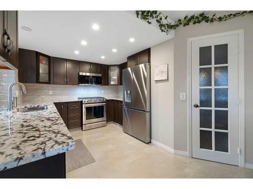 77 Shannon Circle Sw, Calgary, AB - Indoor Photo Showing Kitchen With Stainless Steel Kitchen With Upgraded Kitchen