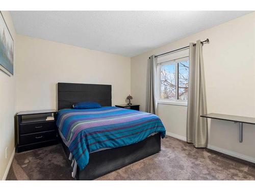 77 Shannon Circle Sw, Calgary, AB - Indoor Photo Showing Bedroom