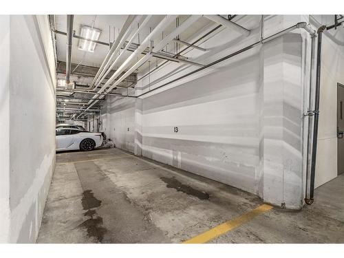 107-1117 1 Street Sw, Calgary, AB - Indoor Photo Showing Garage