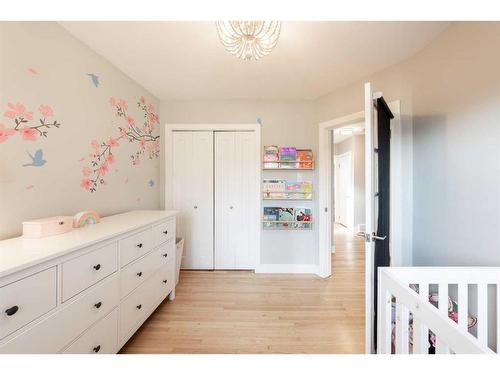 21 Holden Road Sw, Calgary, AB - Indoor Photo Showing Bedroom