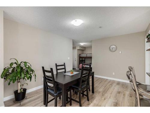 102-7110 80 Avenue Ne, Calgary, AB - Indoor Photo Showing Dining Room