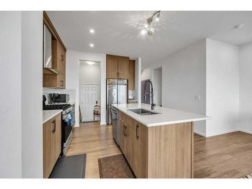 52 Cityline Square Ne, Calgary, AB - Indoor Photo Showing Kitchen With Double Sink