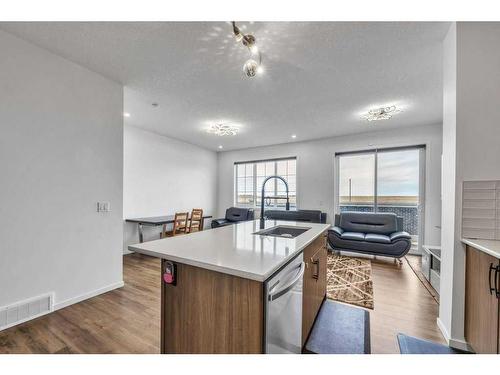 52 Cityline Square Ne, Calgary, AB - Indoor Photo Showing Kitchen With Double Sink With Upgraded Kitchen