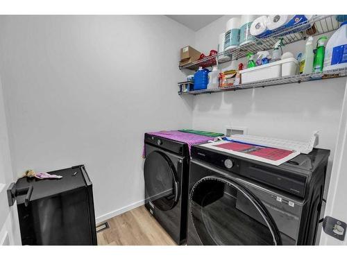 52 Cityline Square Ne, Calgary, AB - Indoor Photo Showing Laundry Room