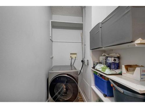 419-816 89 Avenue Sw, Calgary, AB - Indoor Photo Showing Laundry Room