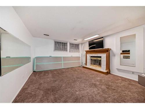 23 Deer Place Se, Calgary, AB - Indoor With Fireplace