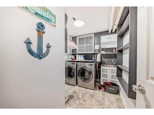 23 Deer Place Se, Calgary, AB - Indoor Photo Showing Laundry Room