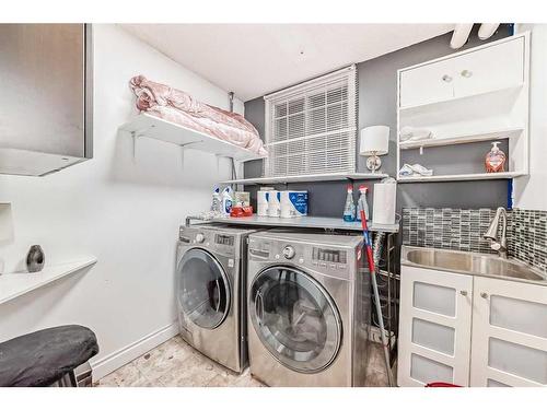 23 Deer Place Se, Calgary, AB - Indoor Photo Showing Laundry Room