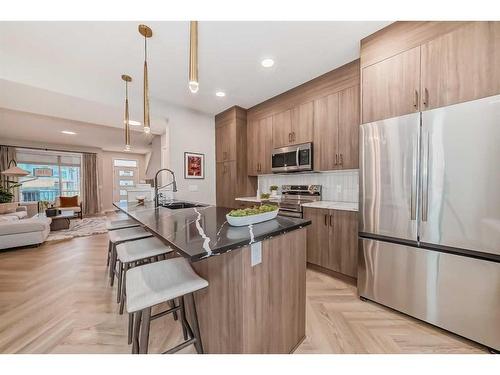 163 Mill Road, Cochrane, AB - Indoor Photo Showing Kitchen With Stainless Steel Kitchen With Upgraded Kitchen