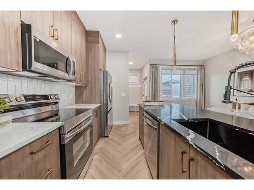 163 Mill Road, Cochrane, AB - Indoor Photo Showing Kitchen With Stainless Steel Kitchen