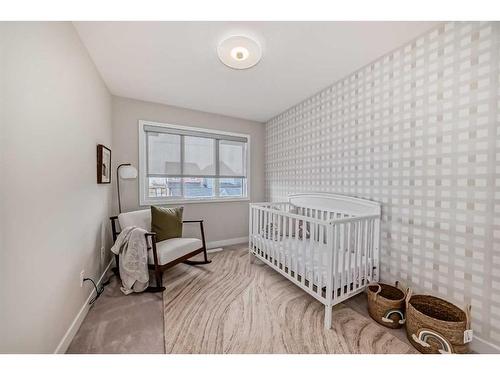 163 Mill Road, Cochrane, AB - Indoor Photo Showing Bedroom