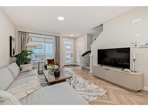 163 Mill Road, Cochrane, AB - Indoor Photo Showing Living Room