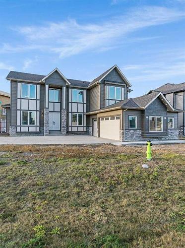 149 Canoe Crescent Sw, Airdrie, AB - Outdoor With Deck Patio Veranda With Facade