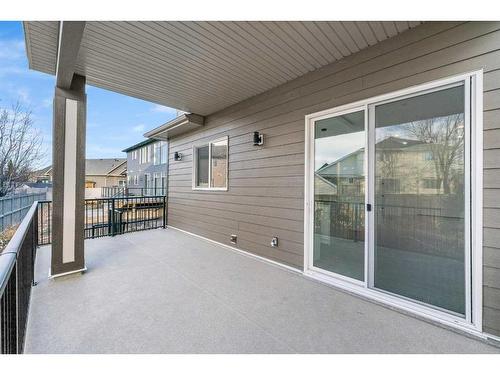 149 Canoe Crescent Sw, Airdrie, AB - Outdoor With Balcony With Deck Patio Veranda With Exterior