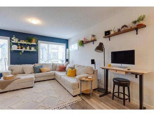 302-15 Evanscrest Park Nw, Calgary, AB - Indoor Photo Showing Living Room