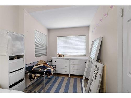 849 Mcpherson Road Ne, Calgary, AB - Indoor Photo Showing Bedroom