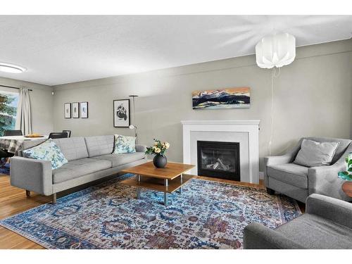 94 Coleridge Road Nw, Calgary, AB - Indoor Photo Showing Living Room With Fireplace