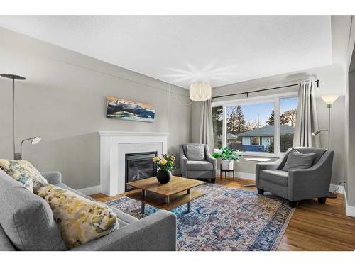 94 Coleridge Road Nw, Calgary, AB - Indoor Photo Showing Living Room With Fireplace