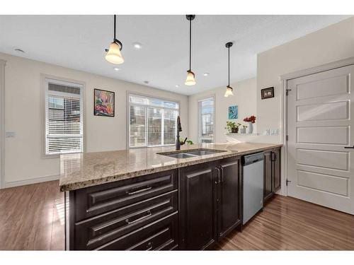 146 Savanna Walk Ne, Calgary, AB - Indoor Photo Showing Kitchen With Double Sink