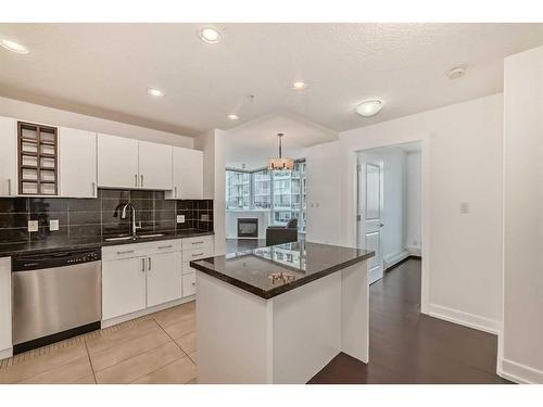 1706-77 Spruce Place Sw, Calgary, AB - Indoor Photo Showing Kitchen With Upgraded Kitchen