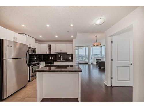 1706-77 Spruce Place Sw, Calgary, AB - Indoor Photo Showing Kitchen With Stainless Steel Kitchen