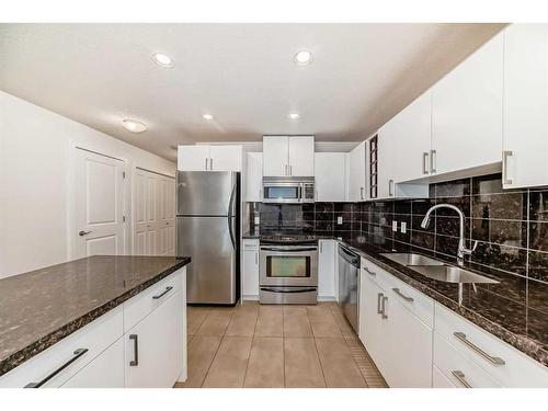 1706-77 Spruce Place Sw, Calgary, AB - Indoor Photo Showing Kitchen With Stainless Steel Kitchen With Double Sink