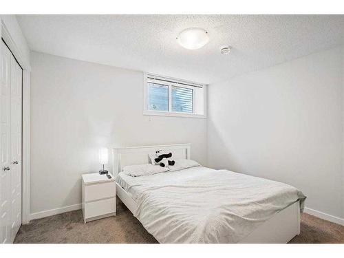 422 Cranbrook Square Se, Calgary, AB - Indoor Photo Showing Bedroom