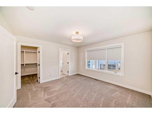 205 Precedence View, Cochrane, AB - Indoor Photo Showing Other Room