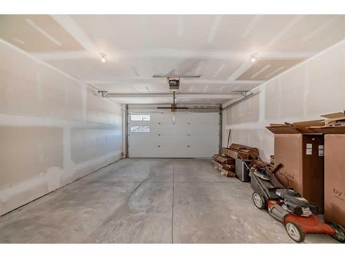 205 Precedence View, Cochrane, AB - Indoor Photo Showing Garage