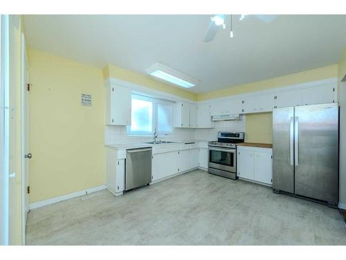 2403 54 Avenue Sw, Calgary, AB - Indoor Photo Showing Kitchen With Stainless Steel Kitchen