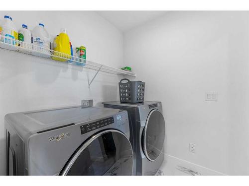 243 Corner Meadows Way Ne, Calgary, AB - Indoor Photo Showing Laundry Room