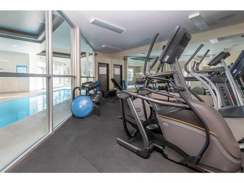 9-122 Village Heights Sw, Calgary, AB - Indoor Photo Showing Gym Room