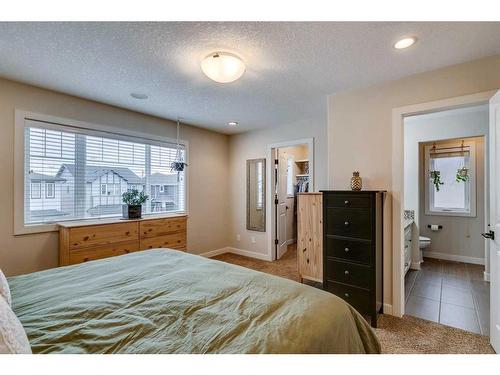 25 Willow Close, Cochrane, AB - Indoor Photo Showing Bedroom