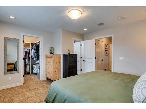 25 Willow Close, Cochrane, AB - Indoor Photo Showing Bedroom