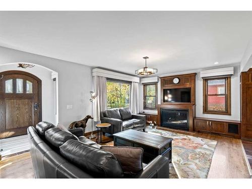 2415 1 Street Nw, Calgary, AB - Indoor Photo Showing Living Room With Fireplace