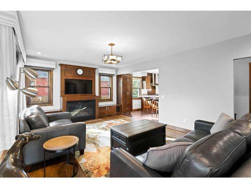 2415 1 Street Nw, Calgary, AB - Indoor Photo Showing Living Room With Fireplace