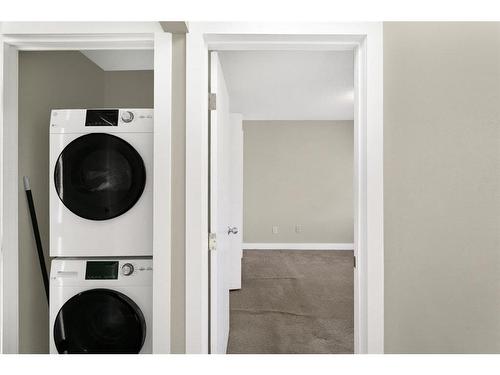 2299 Flanders Avenue Sw, Calgary, AB - Indoor Photo Showing Laundry Room