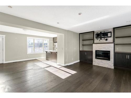 2299 Flanders Avenue Sw, Calgary, AB - Indoor Photo Showing Other Room With Fireplace