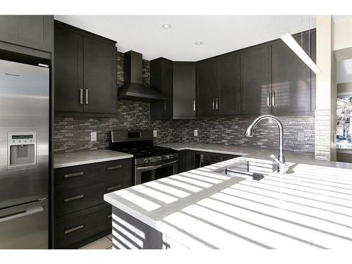 2299 Flanders Avenue Sw, Calgary, AB - Indoor Photo Showing Kitchen With Upgraded Kitchen