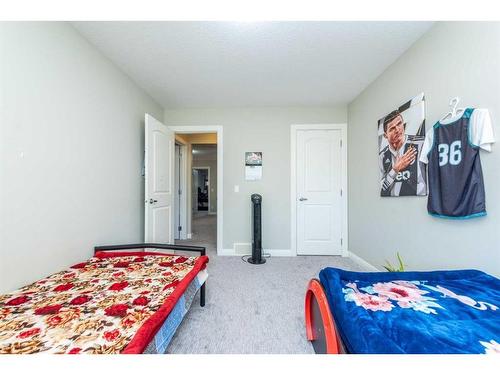 14 Redstone Mews Ne, Calgary, AB - Indoor Photo Showing Bedroom