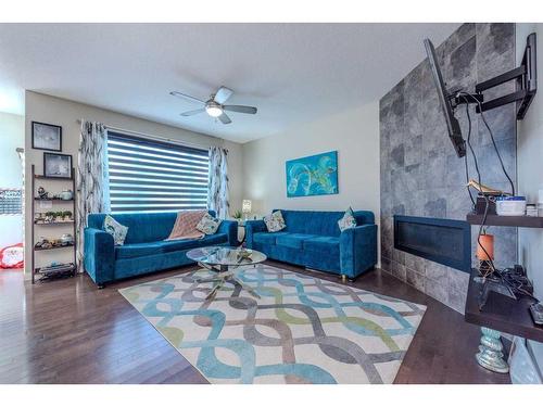 14 Redstone Mews Ne, Calgary, AB - Indoor Photo Showing Living Room With Fireplace