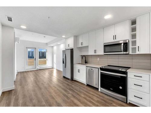 2206-350 Livingston Common Ne, Calgary, AB - Indoor Photo Showing Kitchen With Upgraded Kitchen