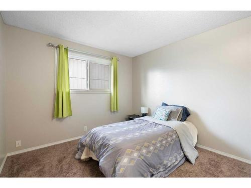 95 Rundleson Way Ne, Calgary, AB - Indoor Photo Showing Bedroom