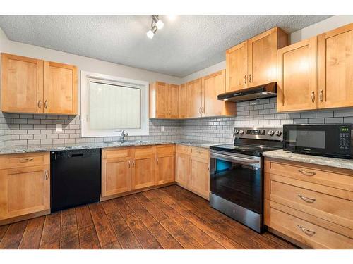 95 Rundleson Way Ne, Calgary, AB - Indoor Photo Showing Kitchen