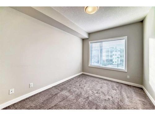 309-4 Sage Hill Terrace Nw, Calgary, AB - Indoor Photo Showing Other Room