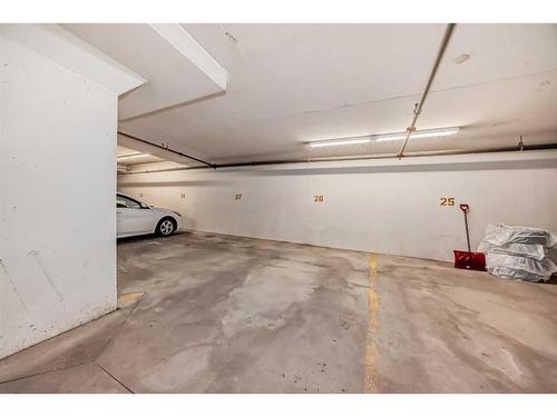 309-4 Sage Hill Terrace Nw, Calgary, AB - Indoor Photo Showing Garage