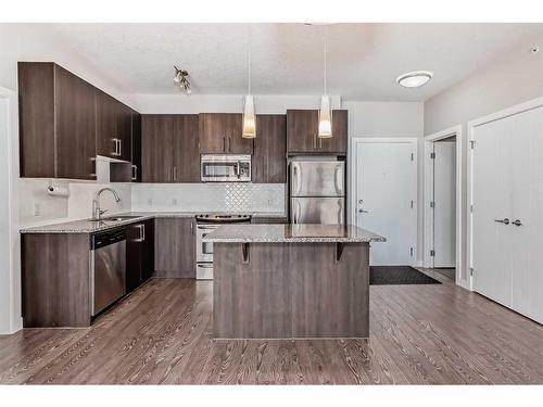 309-4 Sage Hill Terrace Nw, Calgary, AB - Indoor Photo Showing Kitchen With Stainless Steel Kitchen With Upgraded Kitchen