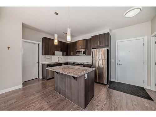 309-4 Sage Hill Terrace Nw, Calgary, AB - Indoor Photo Showing Kitchen With Stainless Steel Kitchen