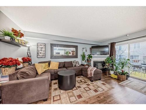 103 Citadel Meadow Gardens Nw, Calgary, AB - Indoor Photo Showing Living Room With Fireplace